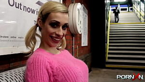 Towheaded Chessie Kay ambling with raw trousers